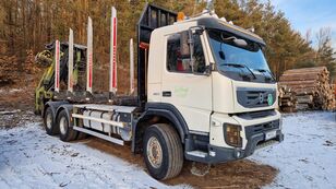camião de transporte de madeira Volvo FMX 460